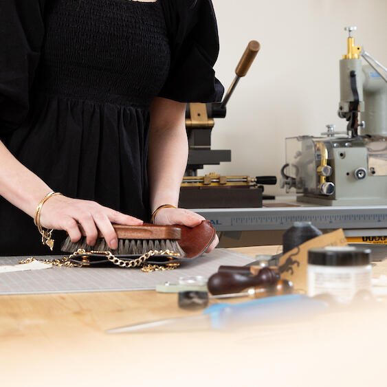 Untitled Branding photography of artisan leather maker in Lincolnshire studio, hands at work.